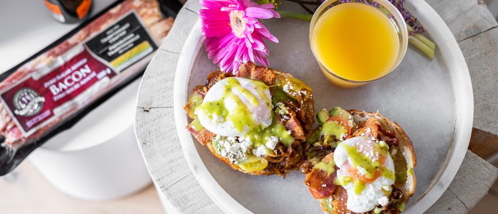 Mother’s Day Poached Eggs on Sourdough with Bacon & Avocado Crema